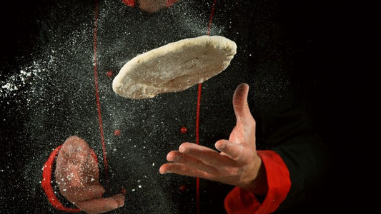 chef is making pizza dough