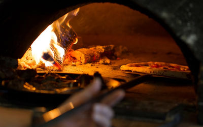 What is the Best Wood for Pizza Ovens: Expert Recommendations for Top Flavors and Heat