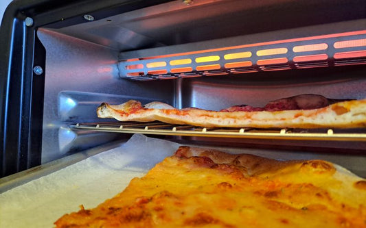 two pieces of delicious pizza cooked in the oven