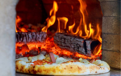 How to Cook Pizza in a Wood Fired Oven: Perfecting the Art of Crust and Flavor