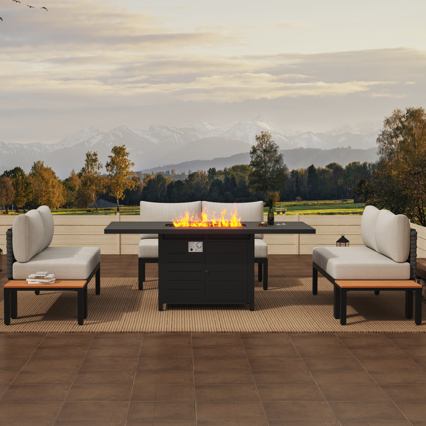 Relax on cushioned seats by the Pizzello Passione 62.5" fire pit table, enjoying patio mountain and tree views.