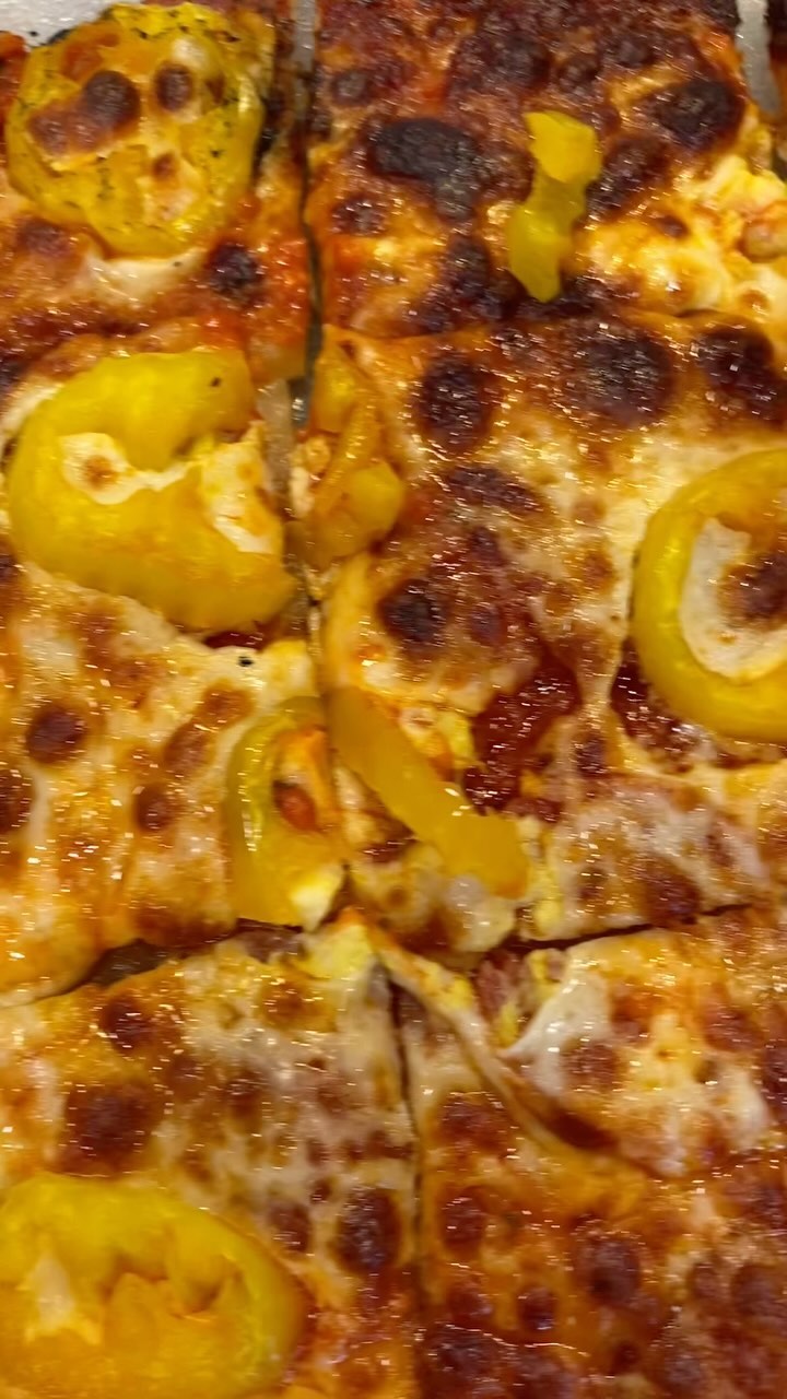 Pepperoni and banana pepper tavern thin crust pizza